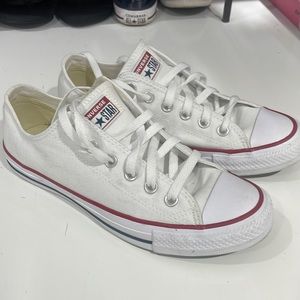 White Converse All Star low tops. Only worn once! Excellent condition.